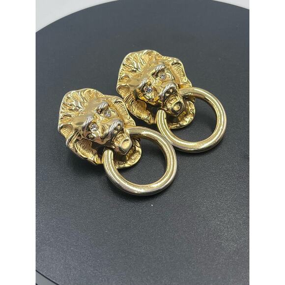 Kenneth Jay Lane Vintage
Lionhead Doorknocker Rhinestone Eyes Earrings - Picture 12 of 14